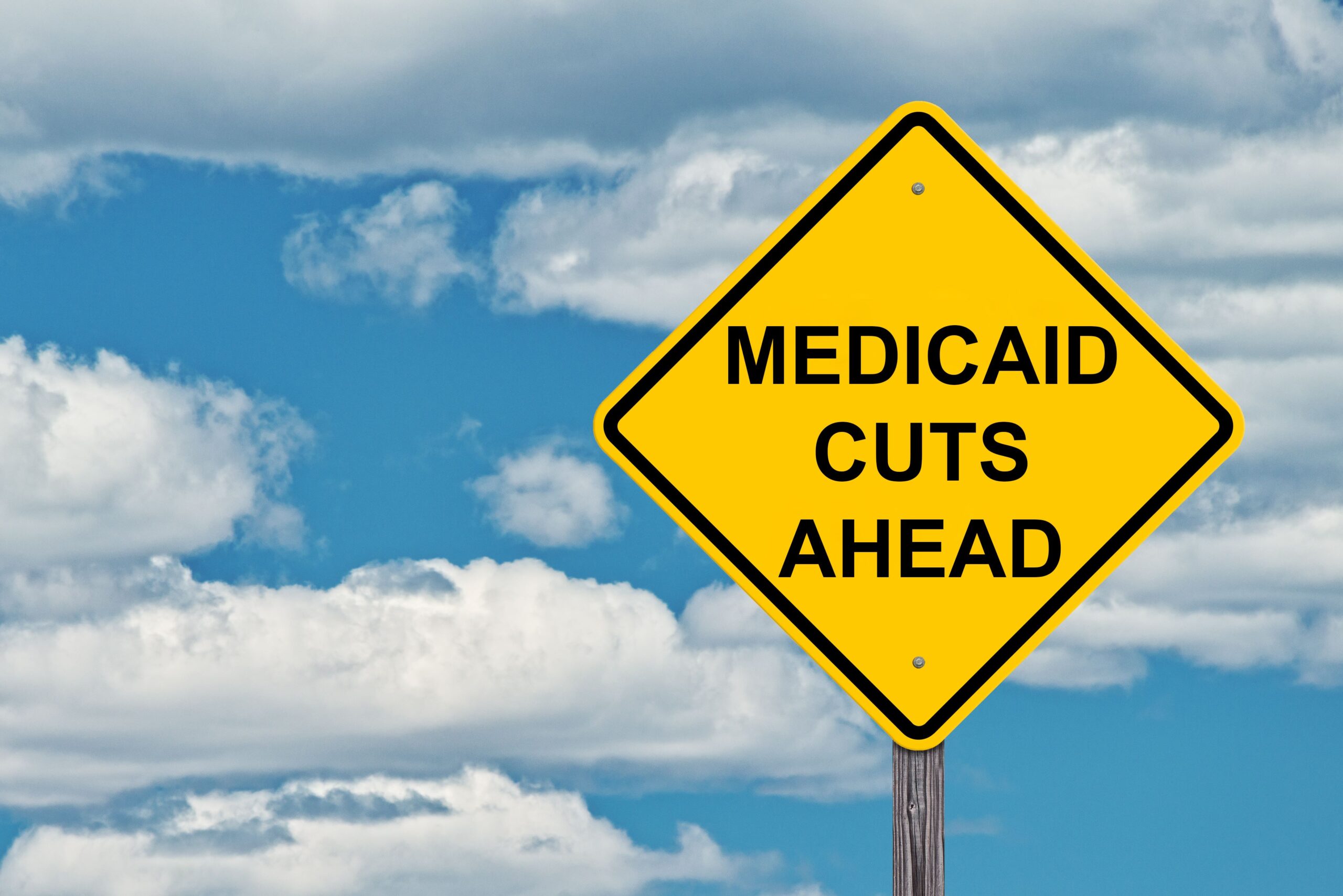 Medicaid cuts Medicaid road sign "cuts ahead"